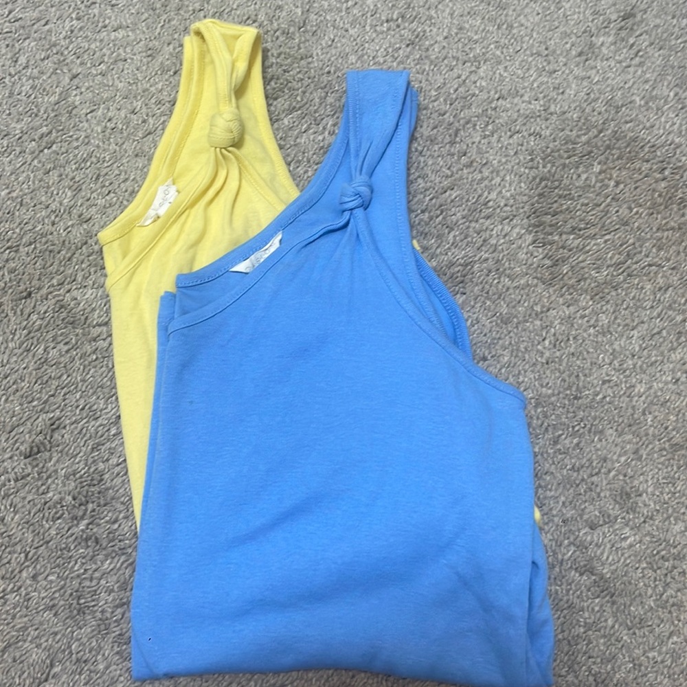 Two women’s knotted tank tops